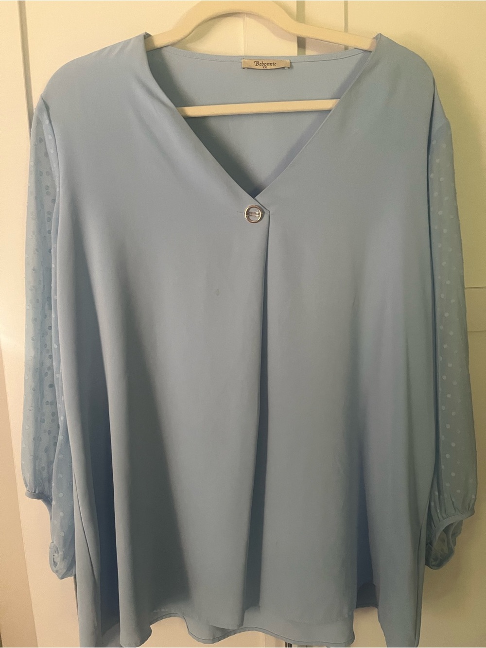 Relaxed V-Neck Women's Blouse in Light Blue with Sheer Polka-Dot Sleeves